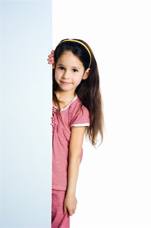 cute child behind a white board isolated Stock Photo - Budget Royalty-Free & Subscription, Code: 400-04358819