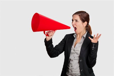 simsearch:400-09223567,k - Business young woman speaking to a megaphone, isolated on white Stock Photo - Budget Royalty-Free & Subscription, Code: 400-04359591