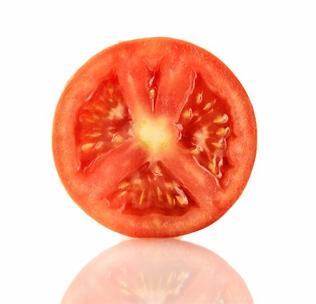 simsearch:400-06880740,k - A Fresh ripe red truss Tomato cut in half isolated on white. Foto de stock - Super Valor sin royalties y Suscripción, Código: 400-04359865