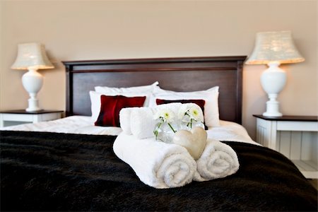 Bedroom ready for guests in soft warm lighting Fotografie stock - Microstock e Abbonamento, Codice: 400-04350037