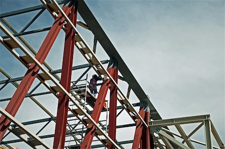simsearch:400-09096995,k - Construction crane workers work height iron sky welder Photographie de stock - Aubaine LD & Abonnement, Code: 400-04350250