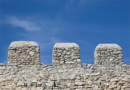 Merlons of an old fortress wall in a sunny day Stock Photo - Budget Royalty-Free & Subscription, Code: 400-04350572