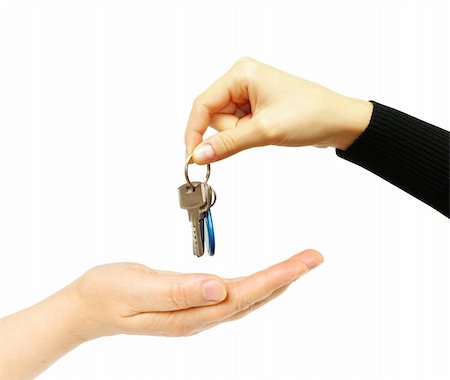 simsearch:400-06855814,k - hand holds a key isolated on white Foto de stock - Royalty-Free Super Valor e Assinatura, Número: 400-04350998