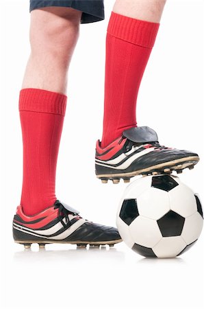 soccer ball sneaker - legs of soccer player with ball isolated on white Stock Photo - Budget Royalty-Free & Subscription, Code: 400-04351155