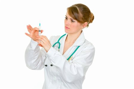 stethoscope injection - Concentrated doctor woman preparing  to inoculate isolated on white Stock Photo - Budget Royalty-Free & Subscription, Code: 400-04351229