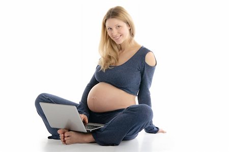 pregnant woman with a laptop sitting on the floor isolated on white Stock Photo - Budget Royalty-Free & Subscription, Code: 400-04351321