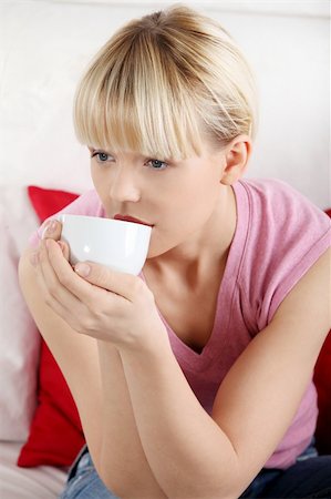 simsearch:400-04335902,k - Young beautiful woman having coffee or tea Photographie de stock - Aubaine LD & Abonnement, Code: 400-04351601
