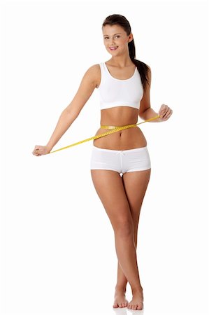 simsearch:400-04844032,k - Woman measuring perfect shape of beautiful body. Healthy lifestyles concept Stock Photo - Budget Royalty-Free & Subscription, Code: 400-04351626