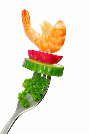 simsearch:400-05324780,k - Fresh vegetables on a fork isolated on white background Photographie de stock - Aubaine LD & Abonnement, Code: 400-04351754
