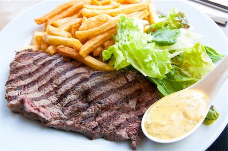 simsearch:400-05330097,k - juicy steak beef meat with salad and french fries Stock Photo - Budget Royalty-Free & Subscription, Code: 400-04351825