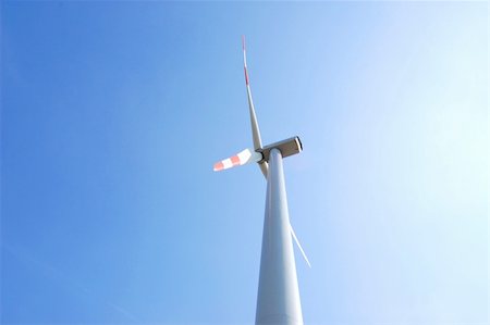 wind turbine under blue sky for alternative energy Stock Photo - Budget Royalty-Free & Subscription, Code: 400-04352123