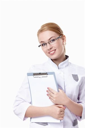 simsearch:400-04375768,k - Attractive doctor with a clipboard on a white background Foto de stock - Royalty-Free Super Valor e Assinatura, Número: 400-04352584