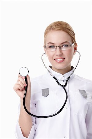 simsearch:400-04375768,k - A young nurse with a stethoscope on a white background Foto de stock - Royalty-Free Super Valor e Assinatura, Número: 400-04352604
