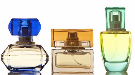 Perfume in a glass bottles on white background Photographie de stock - Aubaine LD & Abonnement, Code: 400-04352768