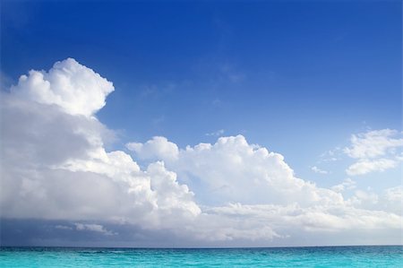 Caribbean aqua sea clouds in blue sky cloudscape horizon Stock Photo - Budget Royalty-Free & Subscription, Code: 400-04352829
