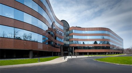 Office building exterior in brick and glass with a blue sky Stock Photo - Budget Royalty-Free & Subscription, Code: 400-04353040