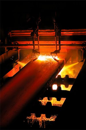 sparks of molten metal - Gas cutting of the hot metal Stock Photo - Budget Royalty-Free & Subscription, Code: 400-04353051