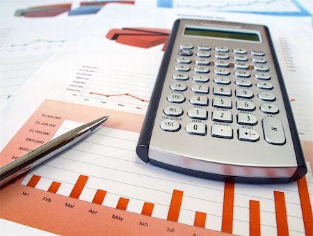 Calculator  and pen on the investment chart Photographie de stock - Aubaine LD & Abonnement, Code: 400-04353158