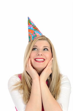 simsearch:400-07748143,k - Pretty party female celebrating birthsday and making a wish. isolated Stock Photo - Budget Royalty-Free & Subscription, Code: 400-04353222