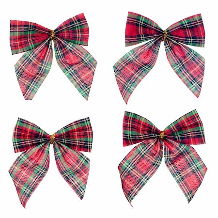 simsearch:400-06172940,k - Four gift red and green ribbon and bow isolated on white background. Photographie de stock - Aubaine LD & Abonnement, Code: 400-04353306