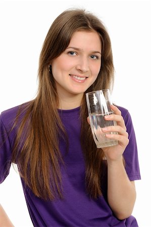 fresh glass of ice water - Young woman with glass of water isolated against white background Stock Photo - Budget Royalty-Free & Subscription, Code: 400-04353765