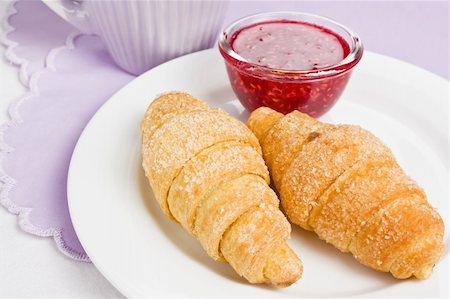 simsearch:400-05387533,k - Croissant with raspberry jam and cocoa for breakfast Stock Photo - Budget Royalty-Free & Subscription, Code: 400-04353972