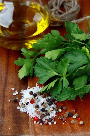 salt, pepper, olive oil, parsley, on a wooden board Stock Photo - Budget Royalty-Free & Subscription, Code: 400-04364051