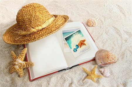 starfish beach nobody - Book with straw hat and seashells at the beach Stock Photo - Budget Royalty-Free & Subscription, Code: 400-04364114