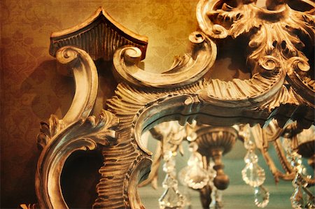 Ornate gilded mirror with reflection and vintage background Stock Photo - Budget Royalty-Free & Subscription, Code: 400-04364117