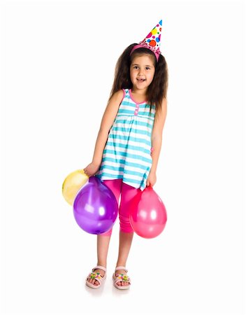 prodigio - Little girl in birthday cap isolated on white Fotografie stock - Microstock e Abbonamento, Codice: 400-04364134
