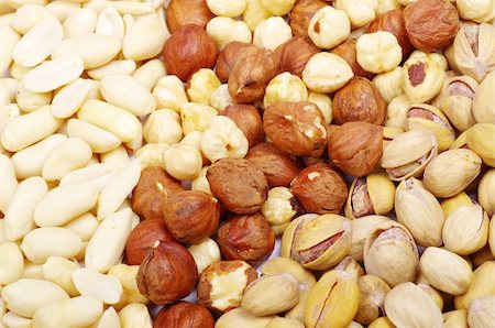 assorted nuts as a background Stock Photo - Budget Royalty-Free & Subscription, Code: 400-04364332