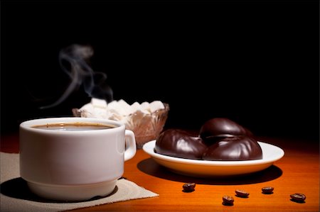 Beautiful coffee still-life on a black background Stock Photo - Budget Royalty-Free & Subscription, Code: 400-04365301