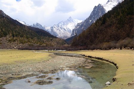 Landscapes of Snow mountains in Daocheng,Sichuan Province, China Stock Photo - Budget Royalty-Free & Subscription, Code: 400-04365372