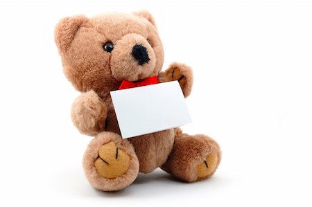 furry teddy bear - toy teddy bear with blank sheet isolated on white background Stock Photo - Budget Royalty-Free & Subscription, Code: 400-04365462