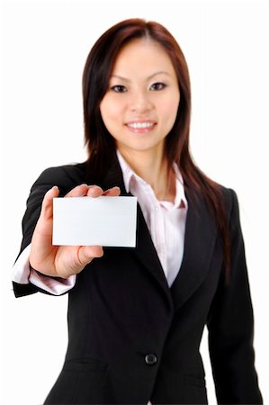 simsearch:400-06071690,k - Asian businesswoman holding a blank business card and smiling at the camera Photographie de stock - Aubaine LD & Abonnement, Code: 400-04365547