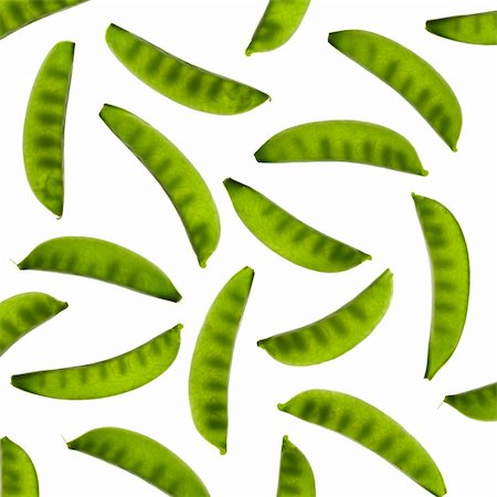 snow pea - Mangetout pods arranged on a white background, showing seeds within pods Stock Photo - Budget Royalty-Free & Subscription, Code: 400-04366082