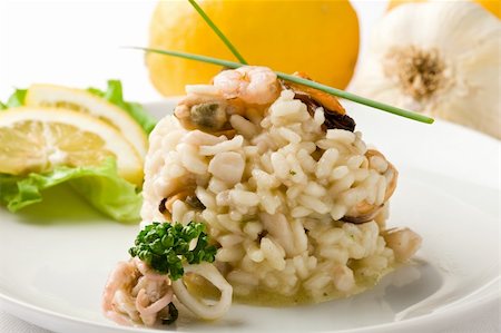 seafood risotto - photo of delicious risotto with seafood on white isolated background Stock Photo - Budget Royalty-Free & Subscription, Code: 400-04366445