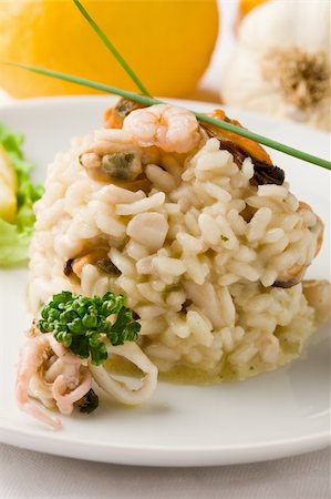 seafood risotto - photo of delicious risotto with seafood on white isolated background Stock Photo - Budget Royalty-Free & Subscription, Code: 400-04366446