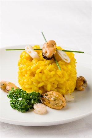 seafood risotto - photo of delicious risotto with saffron and seafood on white isolated background Stock Photo - Budget Royalty-Free & Subscription, Code: 400-04366442