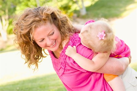 simsearch:400-06172843,k - Mother and Daughter Piggyback Ride in the Park. Stock Photo - Budget Royalty-Free & Subscription, Code: 400-04366652