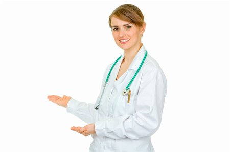 simsearch:400-04351236,k - Welcome! Friendly medical doctor woman inviting to cooperation isolated on white Photographie de stock - Aubaine LD & Abonnement, Code: 400-04367287