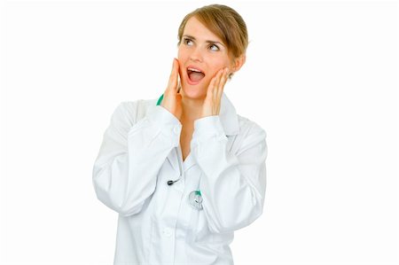 simsearch:400-04351236,k - Surprised medical doctor woman looking in corner at copy space isolated on white Stock Photo - Budget Royalty-Free & Subscription, Code: 400-04367296
