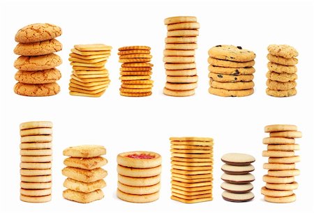 Stacks of different cookies on white background Stock Photo - Budget Royalty-Free & Subscription, Code: 400-04367480