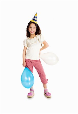 prodigio - Little girl in birthday cap isolated on white Fotografie stock - Microstock e Abbonamento, Codice: 400-04367530