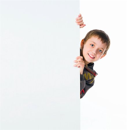 simsearch:400-04364119,k - cute child behind a white board isolated Fotografie stock - Microstock e Abbonamento, Codice: 400-04367587