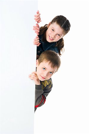 Two smily kids isolated over white background Stock Photo - Budget Royalty-Free & Subscription, Code: 400-04367589