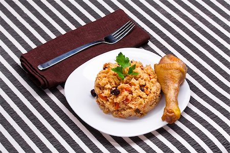 delicious couscous with chicken on a striped background Stock Photo - Budget Royalty-Free & Subscription, Code: 400-04368115