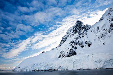 Beautiful snow-capped mountains against the blue sky in Antarctica Stock Photo - Budget Royalty-Free & Subscription, Code: 400-04368153