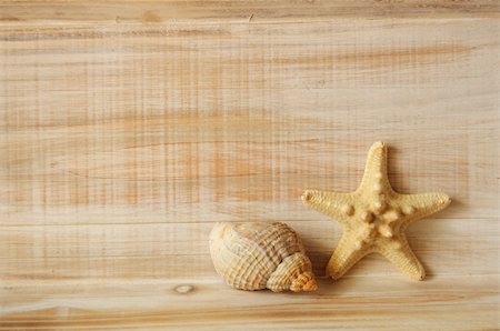 seashell photo concept - star fish and wood copyspace showing holiday or vacation concept Stock Photo - Budget Royalty-Free & Subscription, Code: 400-04368609