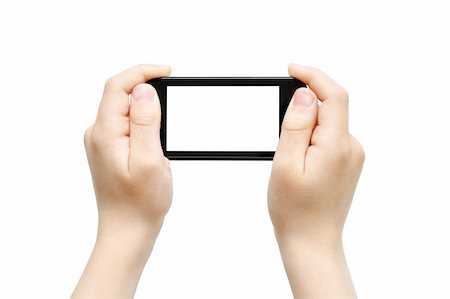 smart phone video - Two hands holding smart phone, playing games, clipping path Stock Photo - Budget Royalty-Free & Subscription, Code: 400-04369845